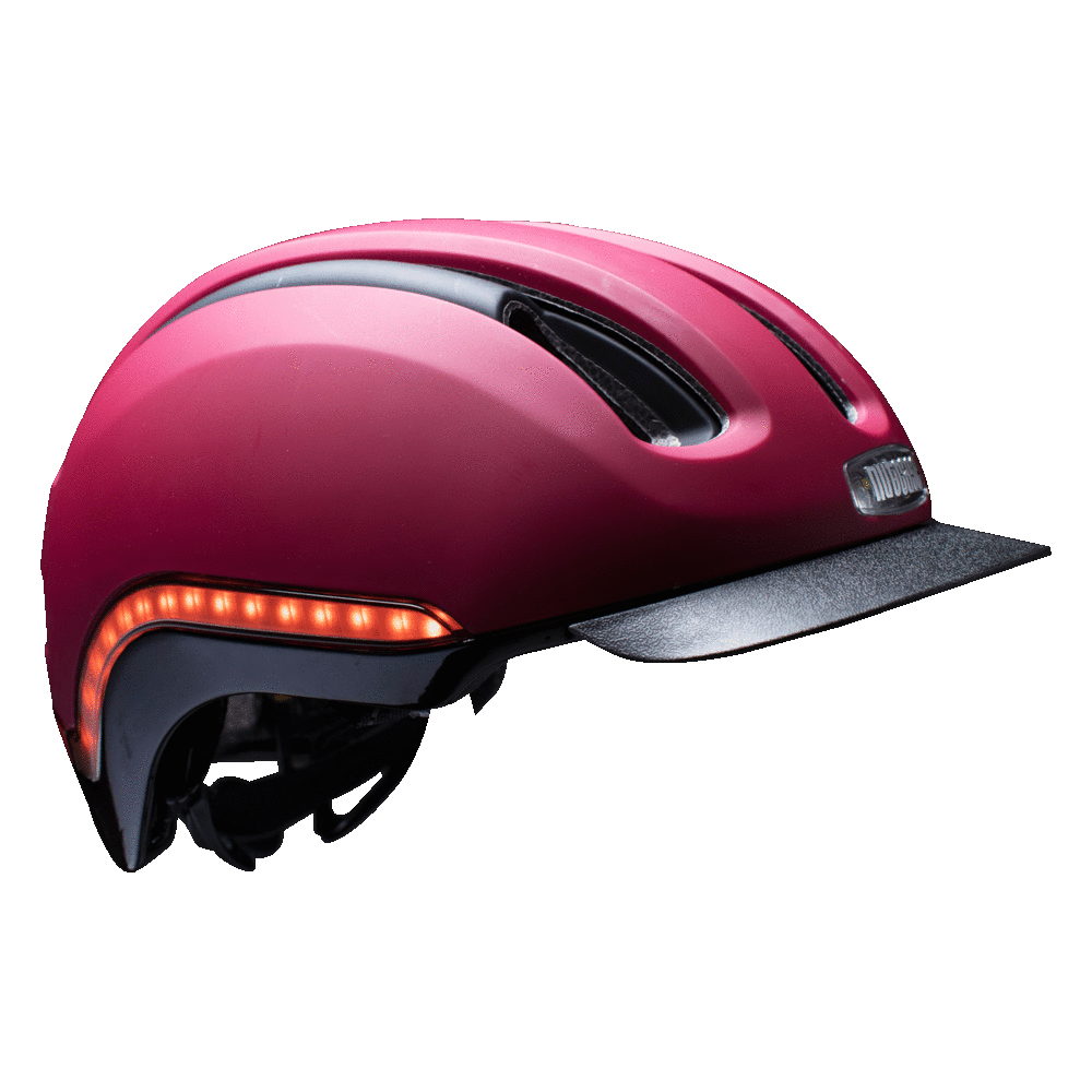 Nutcase Vio Cabernet Matte Adult helmet with MIPS, 200 lumens front LED headlight, 65 lumens side and rear LED lights, reflective print, magnetic buckle for easy on and off, dial adjustable for individualized fit and comfort, duo layer foam construction with denser outer layer and softer inner layer, removable visor